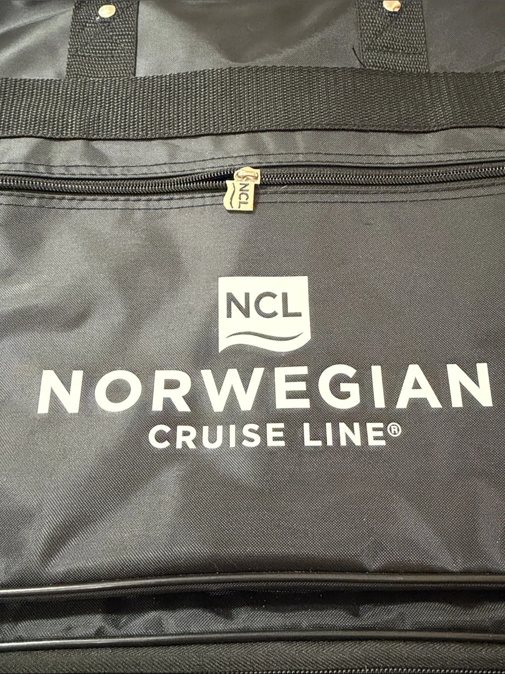 NCL. Norwegian Cruise Line Black Travel Duffel Bag Expandable, Wheels. NWOT
